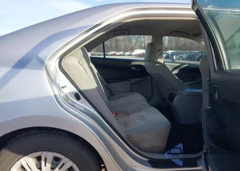 2012 Toyota Camry Le z USA, uszkodzony, nr VIN 4T4BF1FK4CR177574